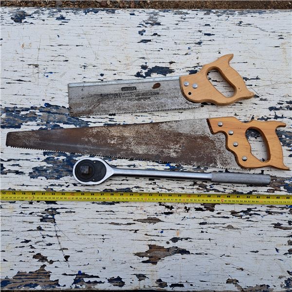 2 handsaws and a socket wrench-size