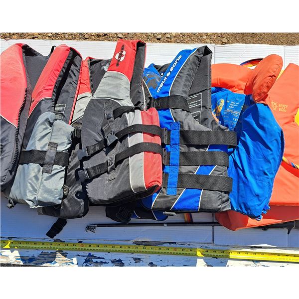 Lot of life jackeyts- sizes vary