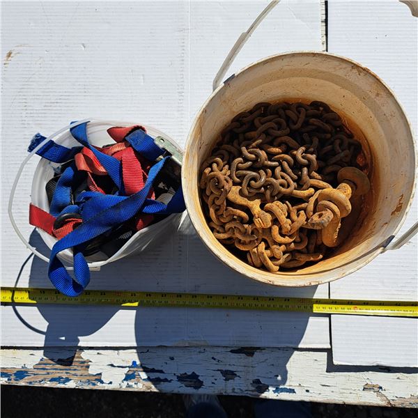 bucket of chains and straps
