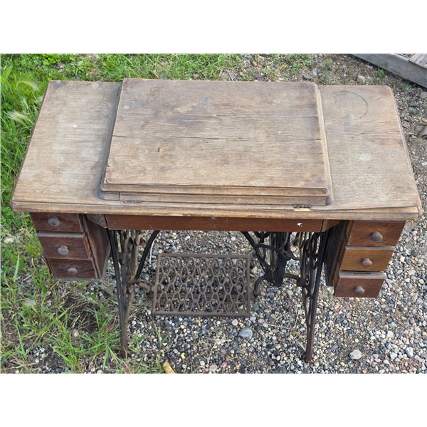 Singer Treadle sewing machine- 35" by 17" by 29"H