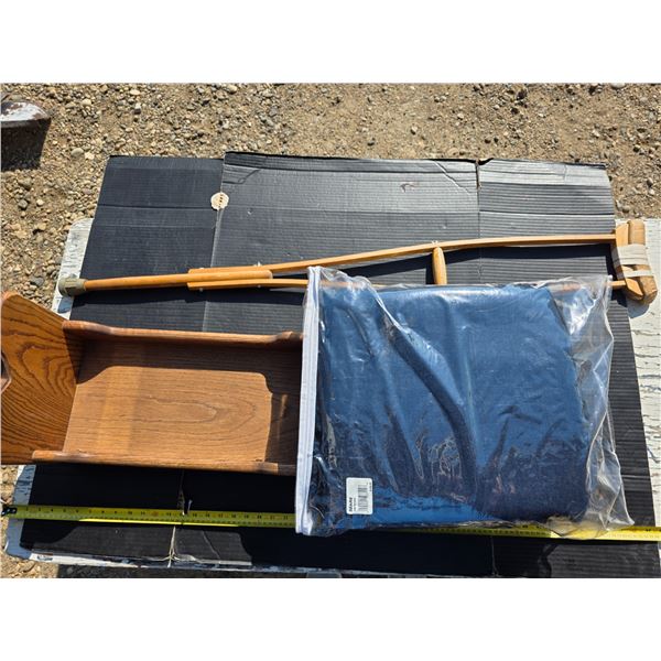 Small wood crib, crutch and couch cushions