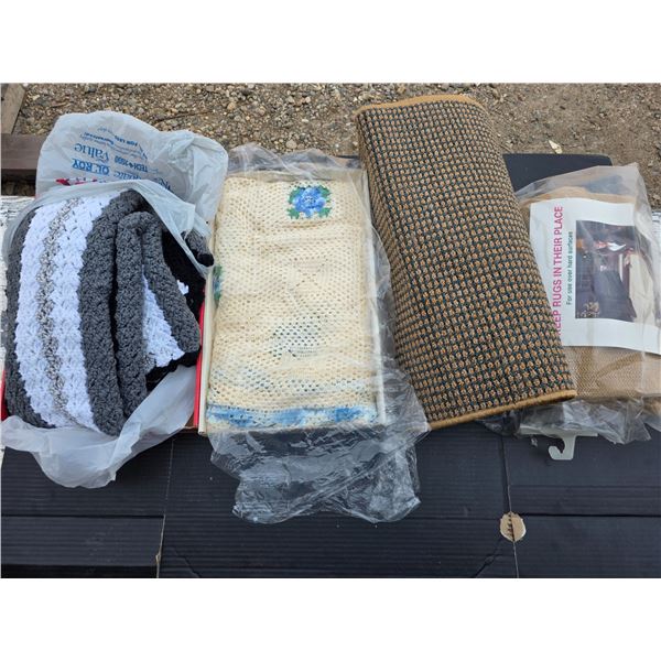 Lot of homemade quilts and rugs