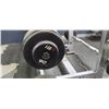 Image 10 : HAMMER STRENGTH RACK WITH SEVEN DIFFERENT IGX CURLED BARBELLS: 20LBS, 60, 70, 80, 90, 100, 110LBS