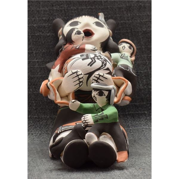 ACOMA  POTTERY STORY TELLER ( M HENDERSON)