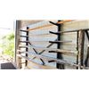 Image 1 : ASSORTED MOSTLY SOLID ROUND STOCK FAB METAL, WITH WALL MOUNTED RACK INCLUDED