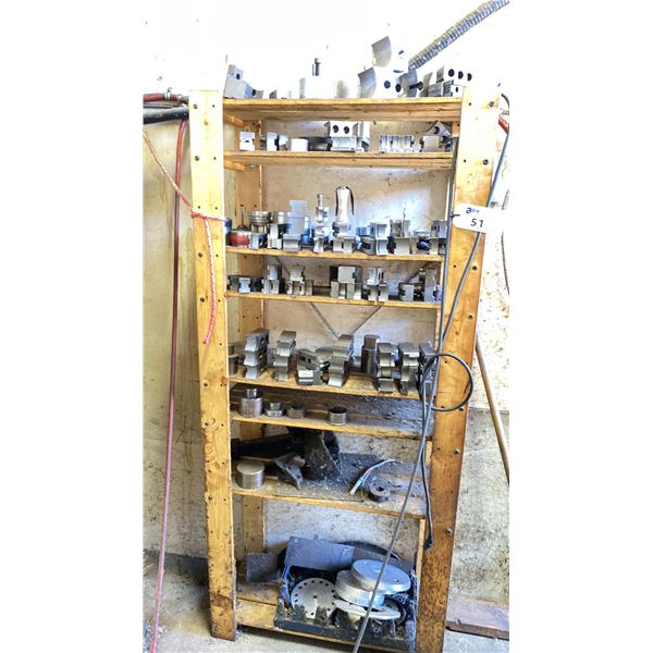 WOOD SHELVING UNIT FULL OF VARIOUS JAWS AND CLAMPS FOR LATHE