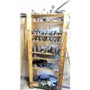 Image 1 : WOOD SHELVING UNIT FULL OF VARIOUS JAWS AND CLAMPS FOR LATHE