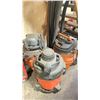 Image 1 : GROUP OF THREE SHOP VACUUMS WITH HOSES AND ASSORTED MISC ITEMS UNDER STAIRS