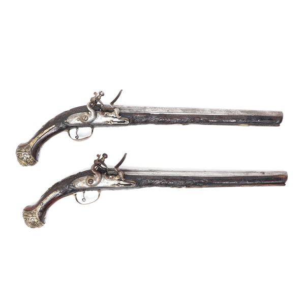 Brace of Ornate Silver & Carved Stock Cavalry Pistols, 18th c.