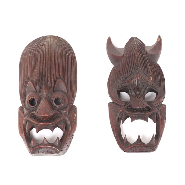 Two Wood Carved Tibetan Transformation Masks