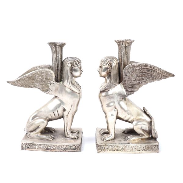 Pair of Silvered Sphynx Candlesticks