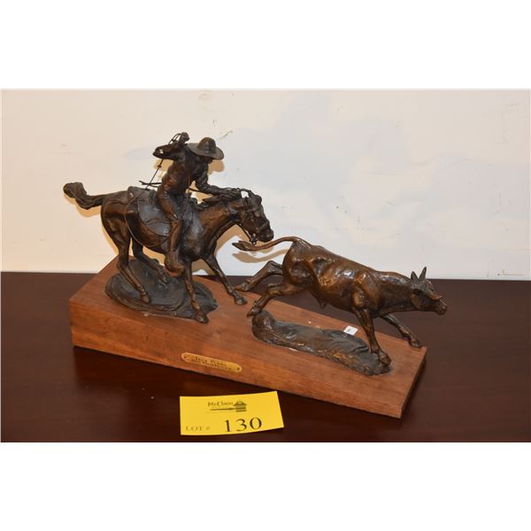 BRONZE COWBOY SCULPTURE; SIGNED 10/100