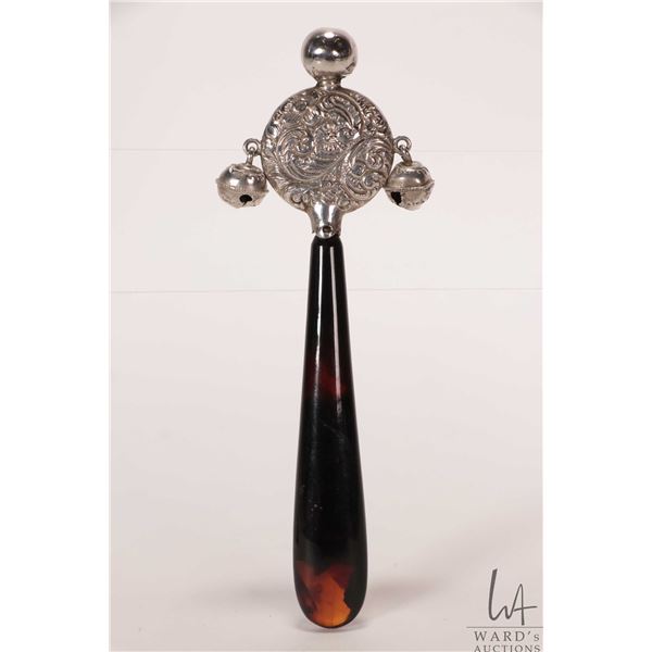 Antique British hallmarked, sterling silver repousse baby rattle with bells and tortoise shell handl