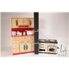 Image 2 : Vintage pressed tin kitchen cabinet 16" H 11" W X 6" D, plus a five piece kitchen canister set inclu