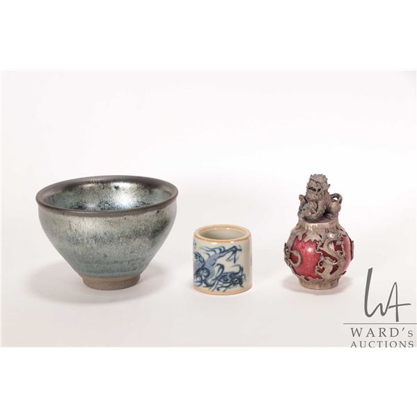 Dark glazed wine bowl, Chinese blue and white archer ring and a foo dog marble ornament