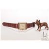 Image 1 : Mechanical gent's wrist watch with leather strap and a copper dog ornament