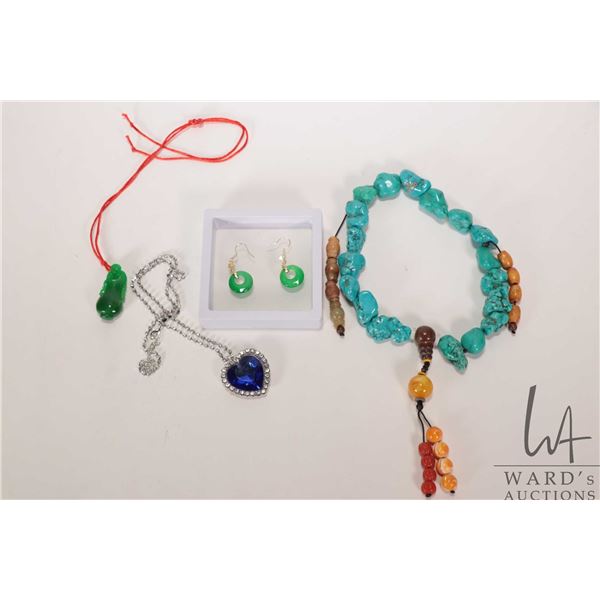 Tibetan bead bracelet plus a pair of earrings, spinach coloured pendant and a heart of the ocean nec