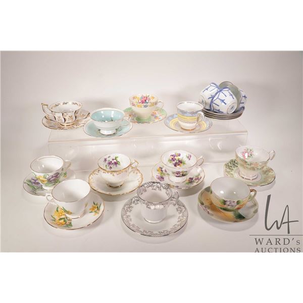 Fifteen collectible china cups and saucers including Royal Crown Derby, Aynsley, Royal Chelsea, Para