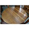 Image 2 : Antique 44" diameter oak dining table with carved paw feet and three 8" insert leaves plus similar s