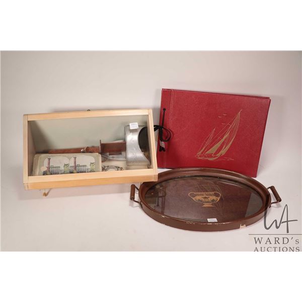 Antique stereoscope with photo cards, two ladies wrist watches, an unused photo album with original 