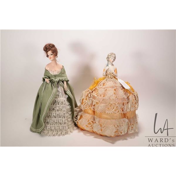 Two antique dolls including 15 1/2" with composition shoulder plate head on arms and dress made from