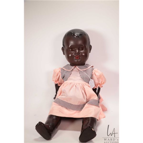 Antique Armand Marseille 542/8k 24" baby doll with glass sleep eyes on five piece composition body. 