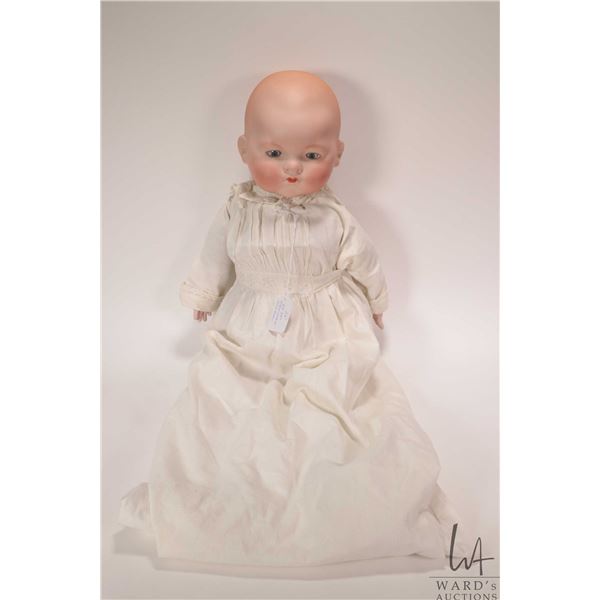 Antique AM 341 "Dream Baby" with bisque head on cloth frog body, glass sleep eyes and replaced bisqu