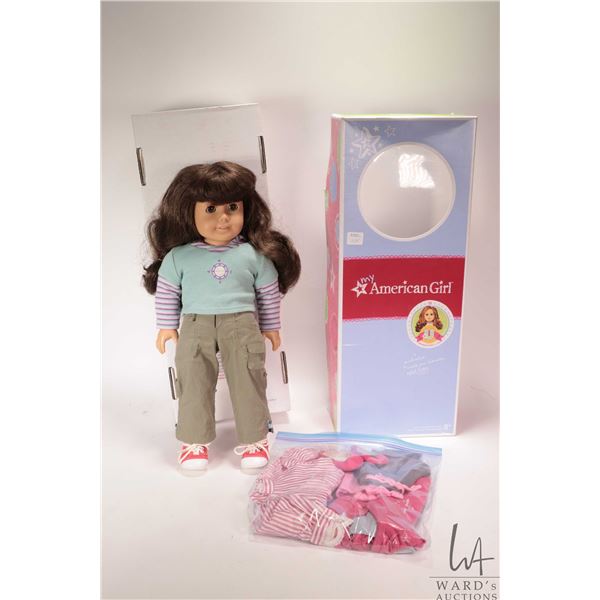 Boxed Mattel American Girl Samantha with a selection of American Girl tagged clothing