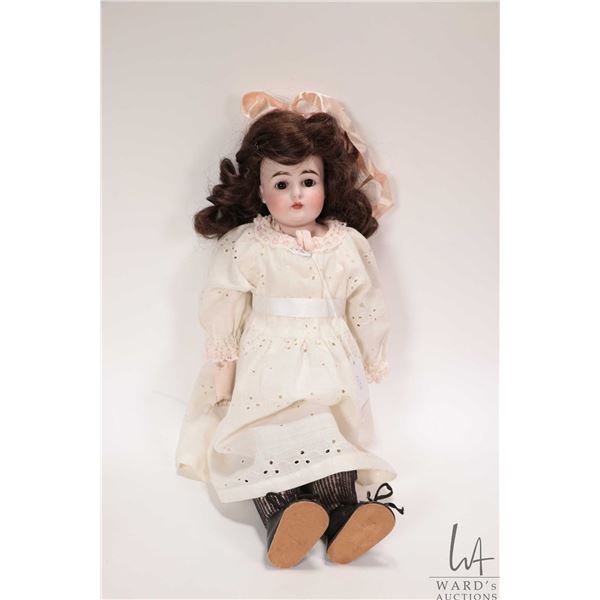 Antique 18" Kestner 166.7 bisque head doll on leather body. No cracks seen to bisque  Note: Viewing 