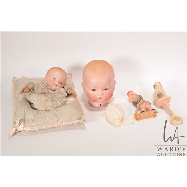 Antique Armand Marseille 341 Dream Baby hand puppet and a 341/4 Dream baby head plus two antique cel