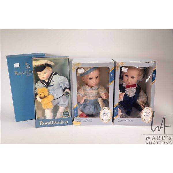 Three H.R.H Prince Williams dolls including two House of Nisbet and one Royal Doulton porcelain doll