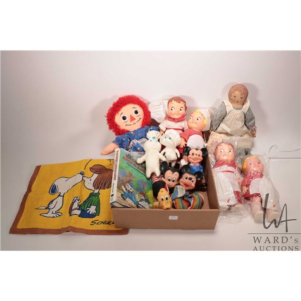 Selection of vintage dolls including Campbells Soup kids, vintage Mickey Mouse puppet, Raggedy Ann d