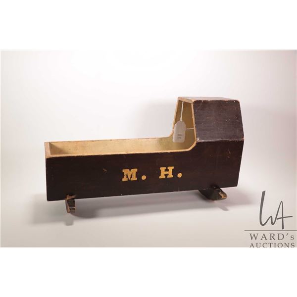 Antique hand made doll's cradle with initials M.H. on side, 22" in length