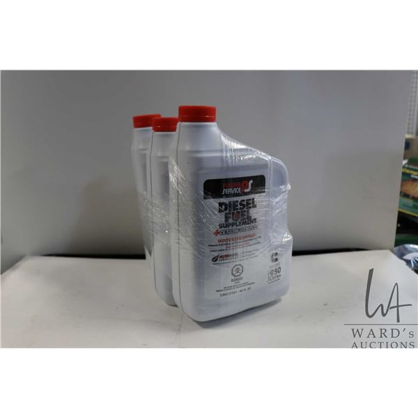 Three 1.893 ltr containers of Power Service Diesel Fuel supplement