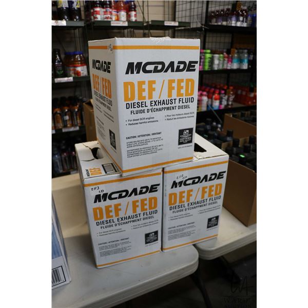 Three 9.46 L boxes of McDade Diesel Exhaust fluid