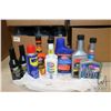 Image 1 : Selection of automotive fluids including one 400 ml container of STP oil treatment, one 354 ml conta