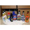 Image 1 : Selection of automotive fluids including one 400 ml container of STP oil treatment, one 354 ml conta