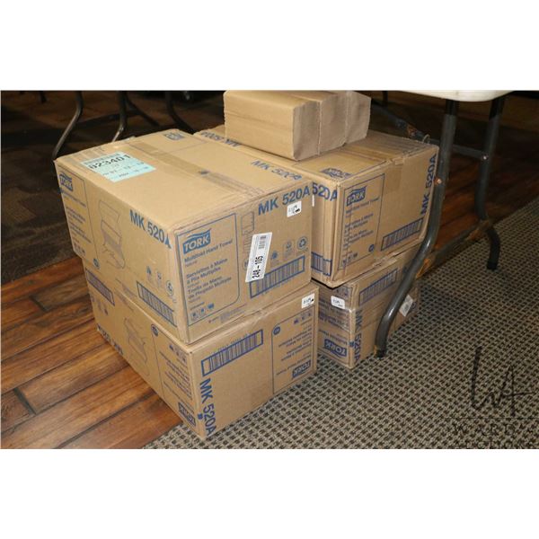 Four boxes of Tork multi fold hand towels Part # MK 520A