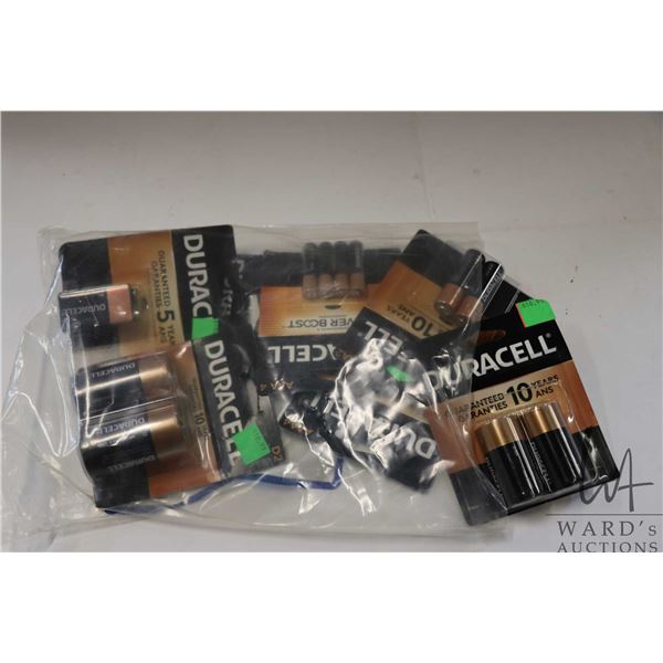 Selection of Duracell batteries including 8 AAA, 4 AA, 1 9V, 2 C cells and 2 D cells