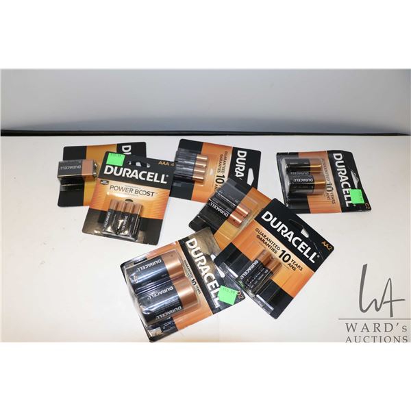 Selection of Duracell batteries including 8 AAA, 4 AA, 1 9V, 2 C cells and 2 D cells