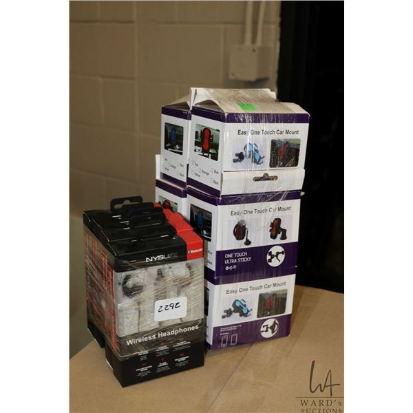 Six new in package Easy one touch car mount phone holders and five sets of NYS Life wireless headpho