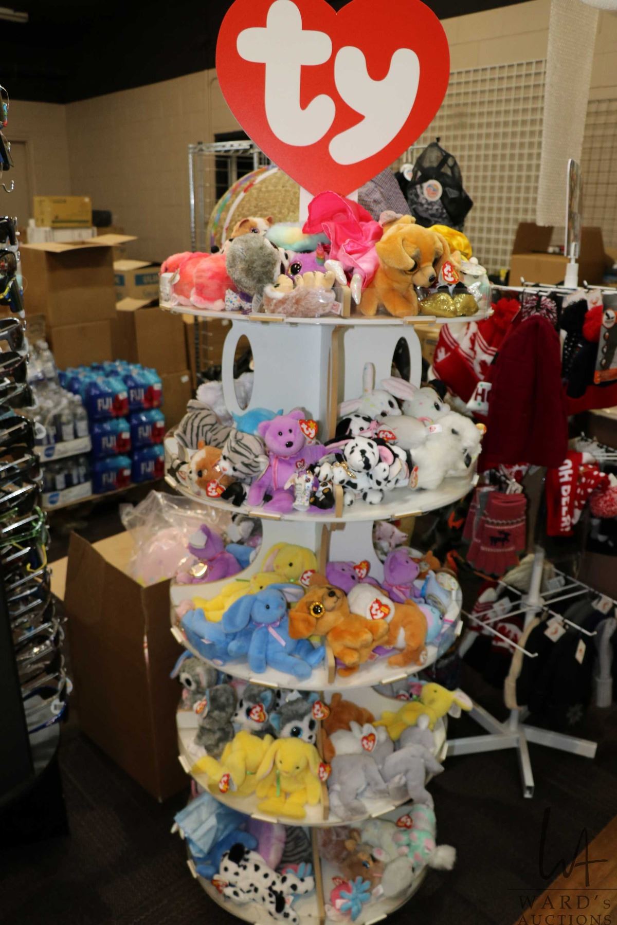 TY display rack of Beanie Babies plus a box of Beanie Babies