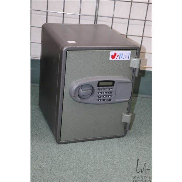 Fire resistant combination safe made by ALS, model no. EM-016, serial number ALS10090092, 15 1/2" H 