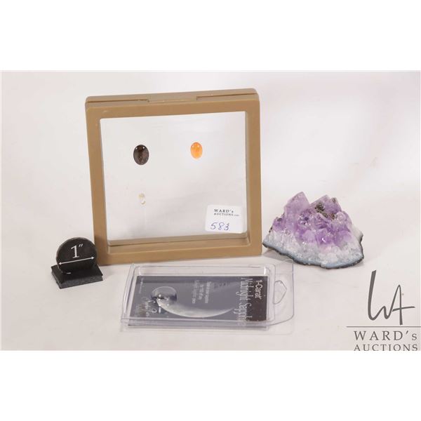 Selection of loose gemstones including sample1 carat sapphire and a small geode crystal