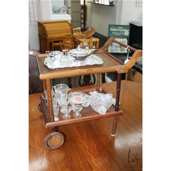 Child sized tea trolley 17" in height to handle plus selection of serving pieces including tea set, 