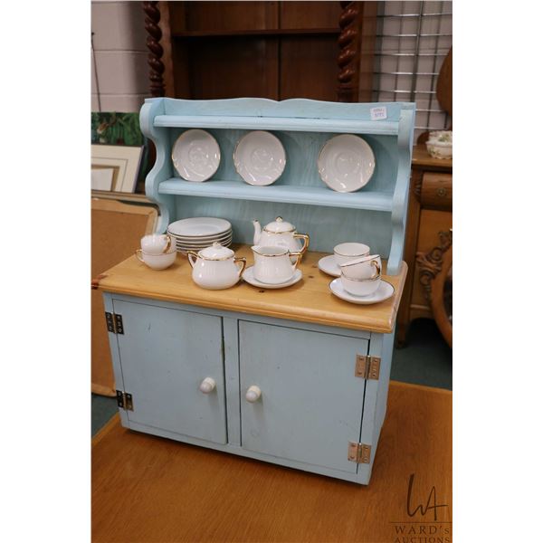 Doll's Welsh dresser 24" in height and a child's Japanese hand painted tea set