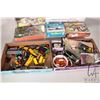 Image 2 : Four building kits and two boxes of building kit leftovers and a selection of train set sized vehicl