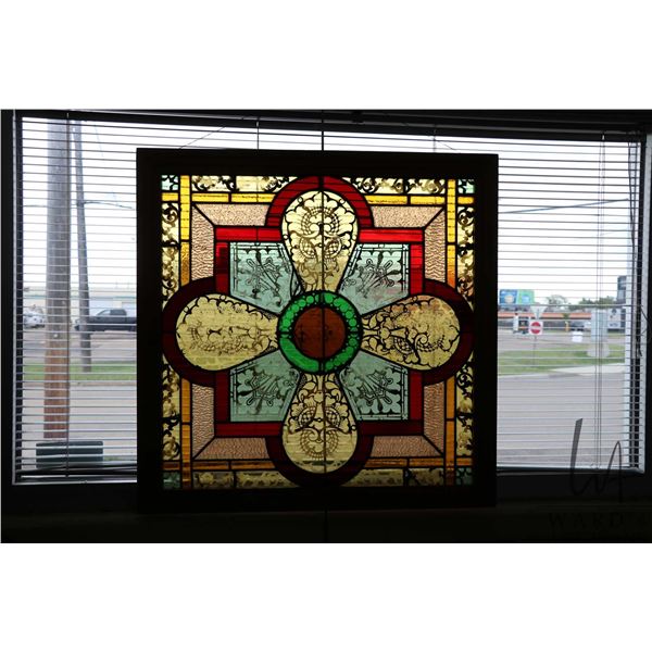 Antique leaded, painted and stained framed glass panel, purportedly from an Italian church, outside 