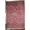 Image 1 : 100% handmade Iranian wool carpet "Mashad" with center medallion, red background and overall floral 