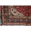 Image 2 : 100% handmade Iranian wool carpet "Tabriz" with center medallion, red background, floral pattern and
